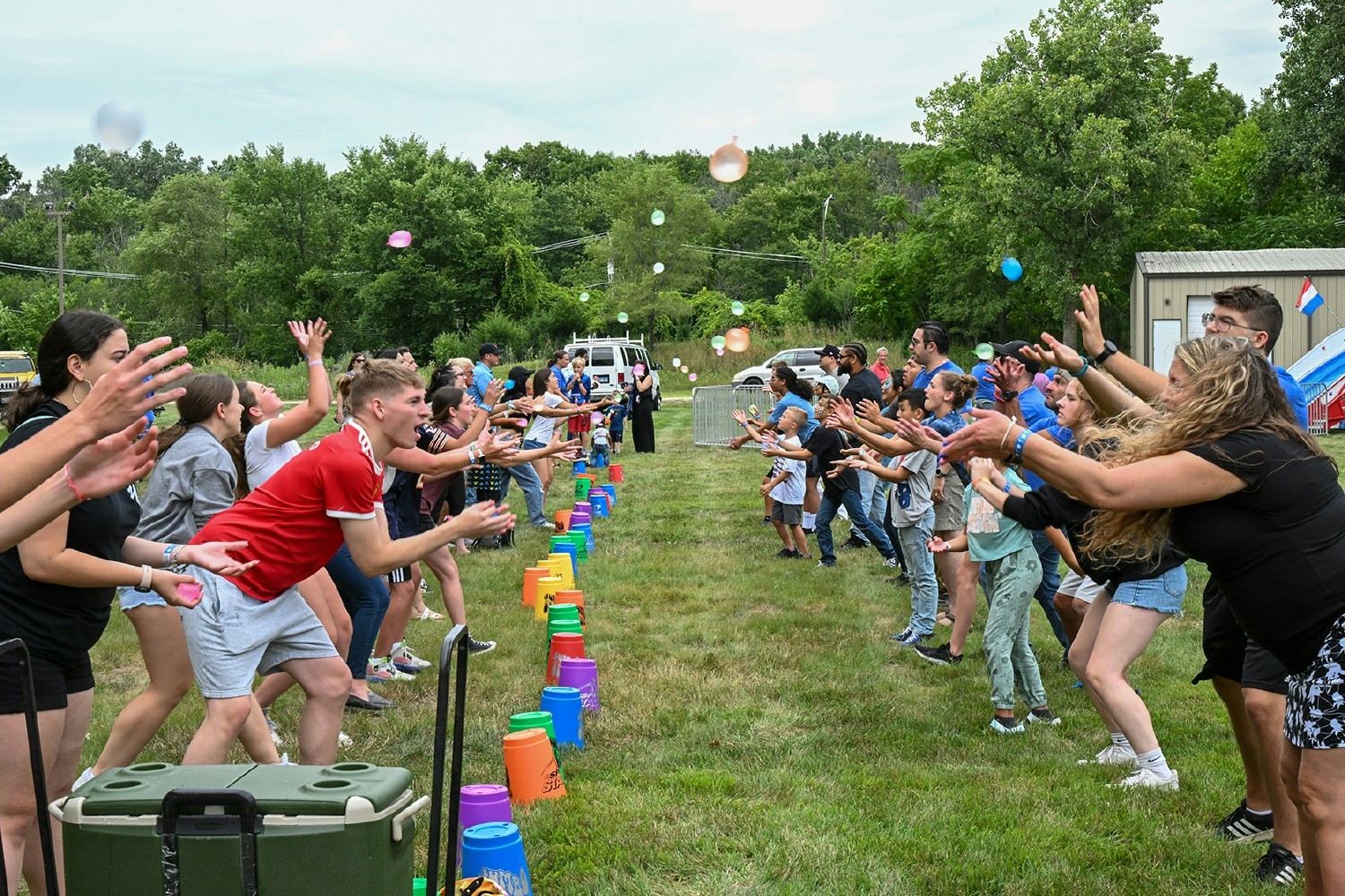 Families enjoy food, entertainment and games at Sasser's annual summer picnic.