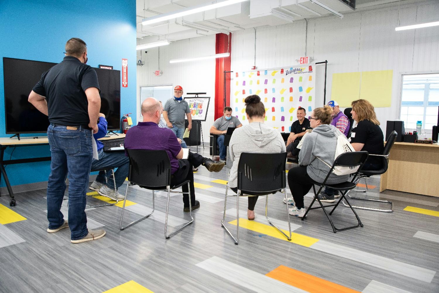 A daily stand-up meeting with teams.