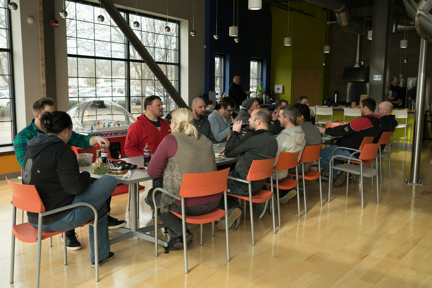 AccuLynx employees eating lunch together.