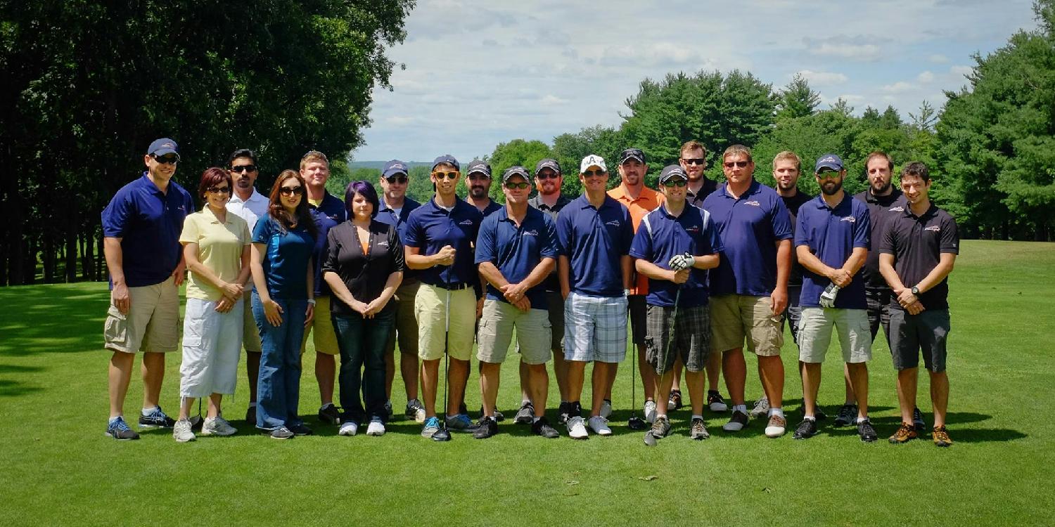 AccuLynx employees enjoying an afternoon of golf.