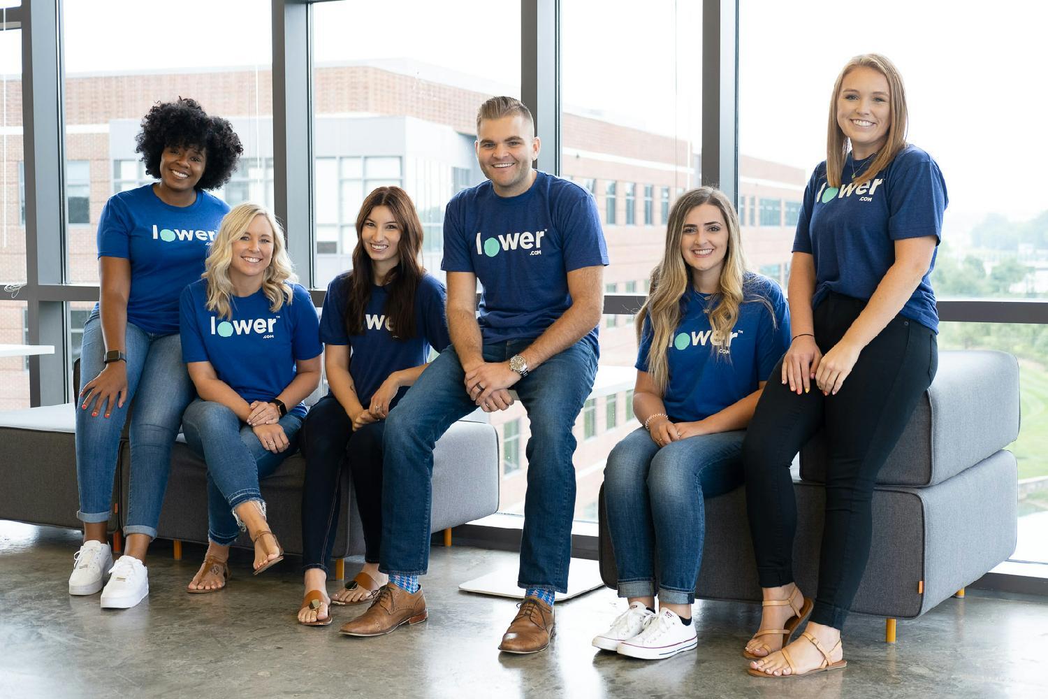 The Lower.com Talent Acquisition team wearing their Lower tee shirts.