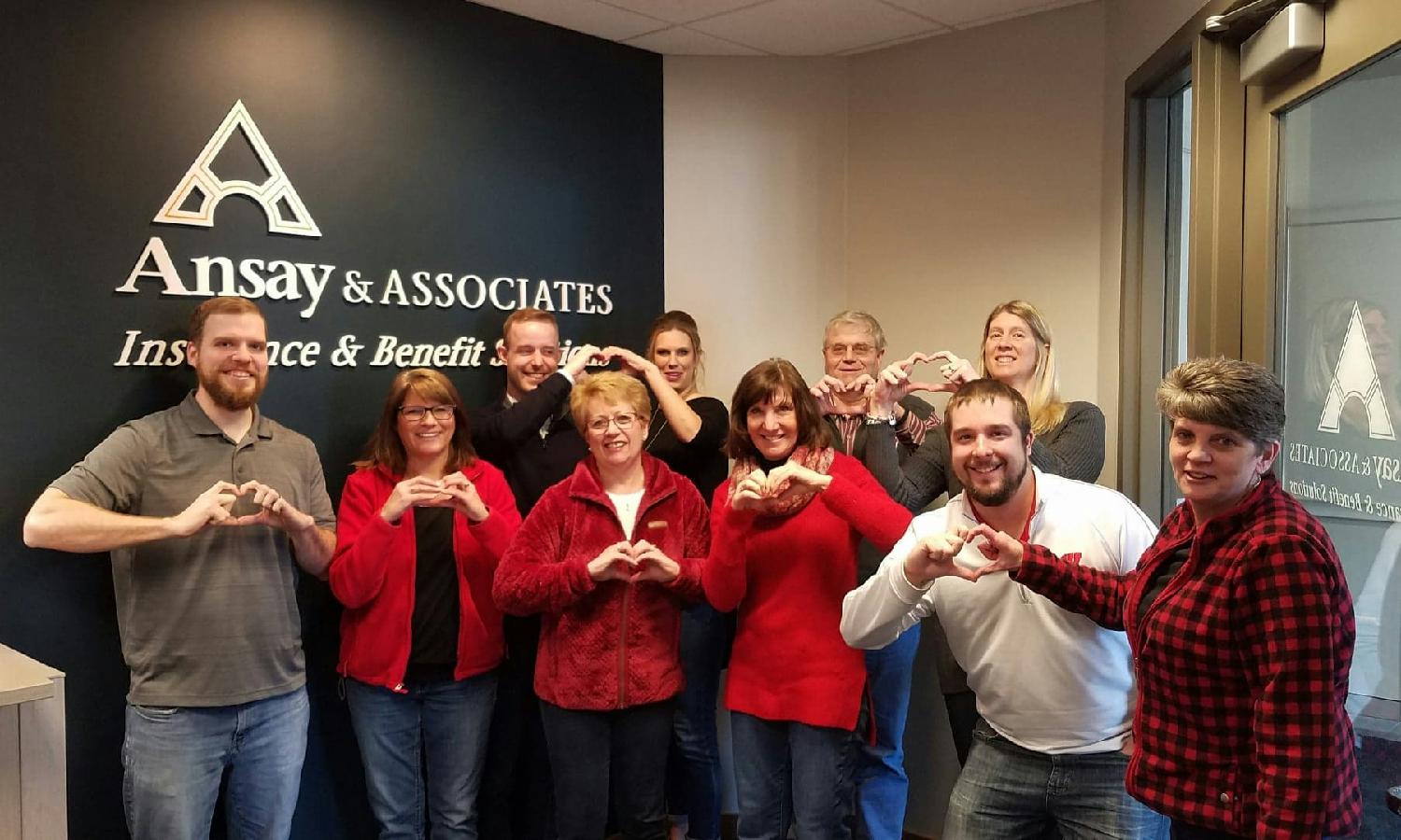 Madison office team showing their Ansay love on Wear Red Day!