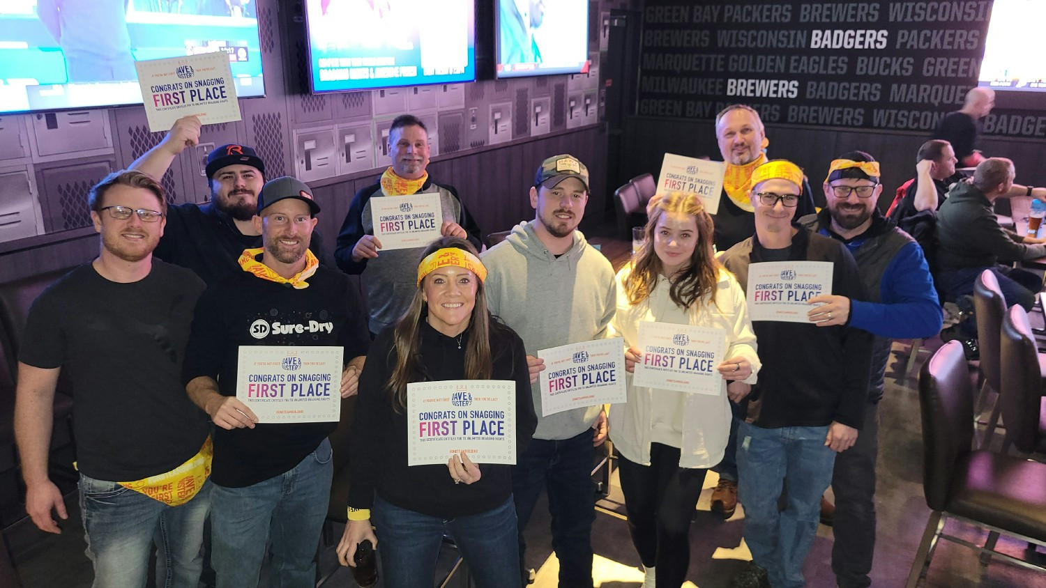Winners of a team building event at Dave and Buster's