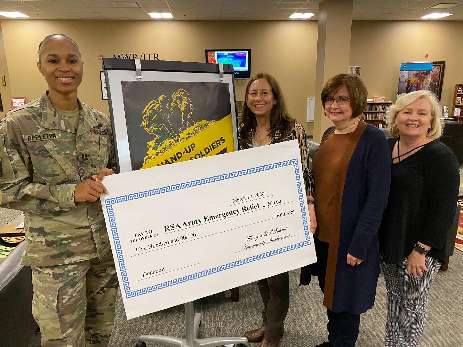 Community Action Committee donation to Army Emergency Relief (AER)