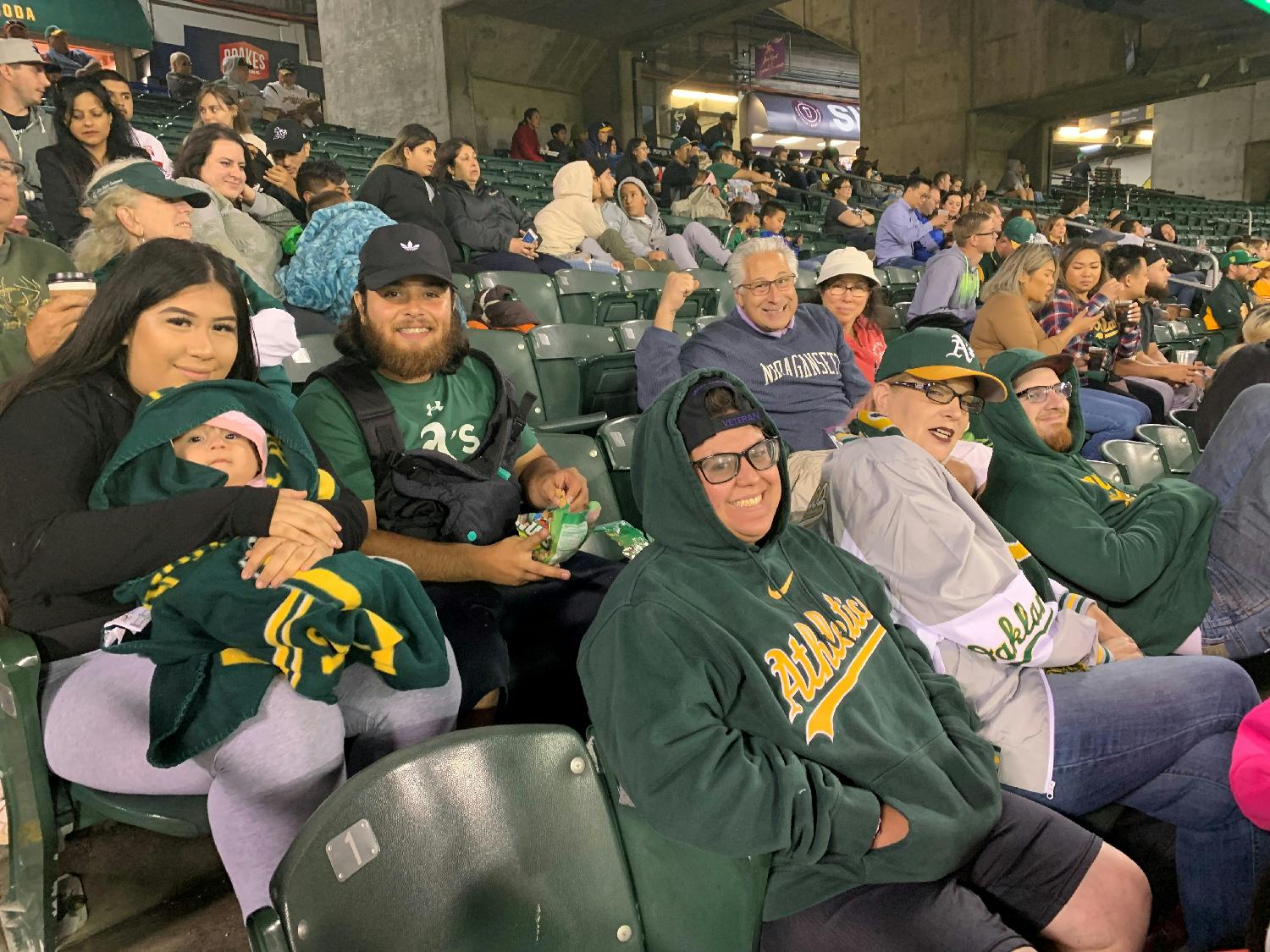 Some team members at an A’s Game