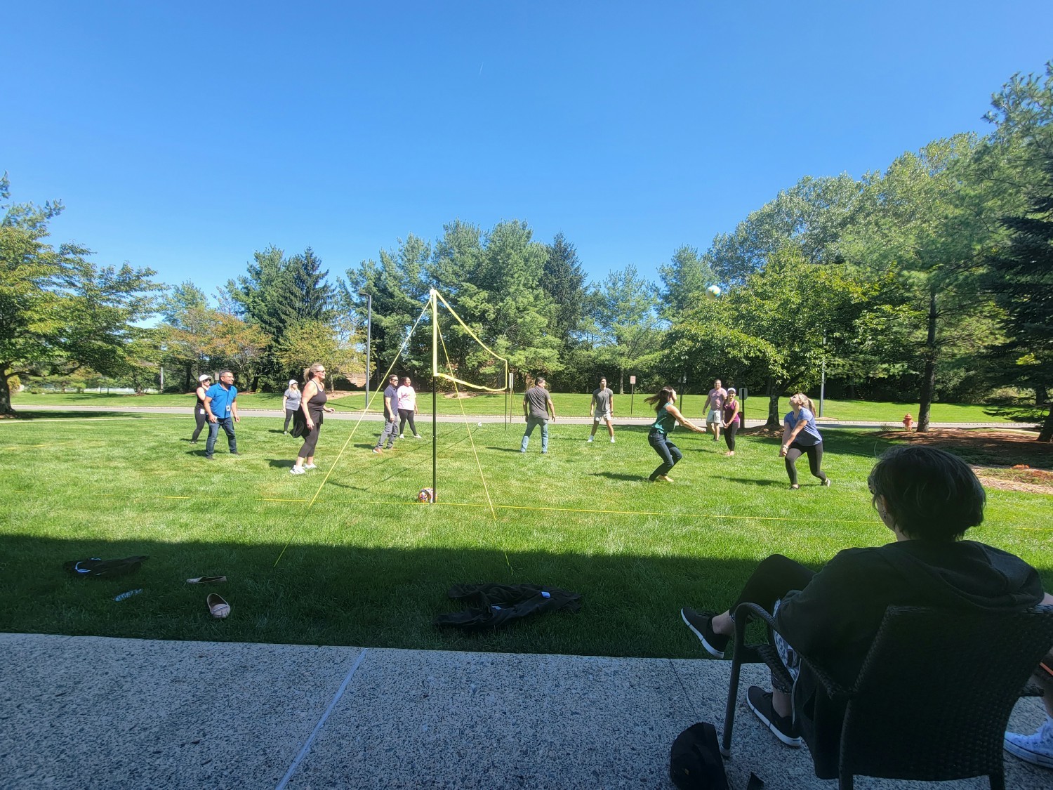 Employees enjoyed a couple games of volleyball at the summer picnic while others played life size Connect 4 and dice. 