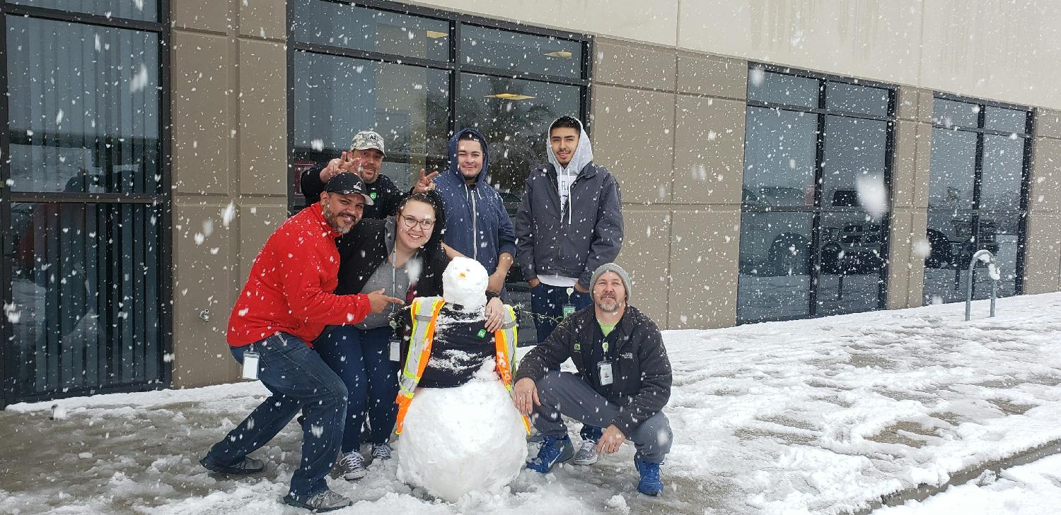 The team enjoying the rare snowfall in Tucson