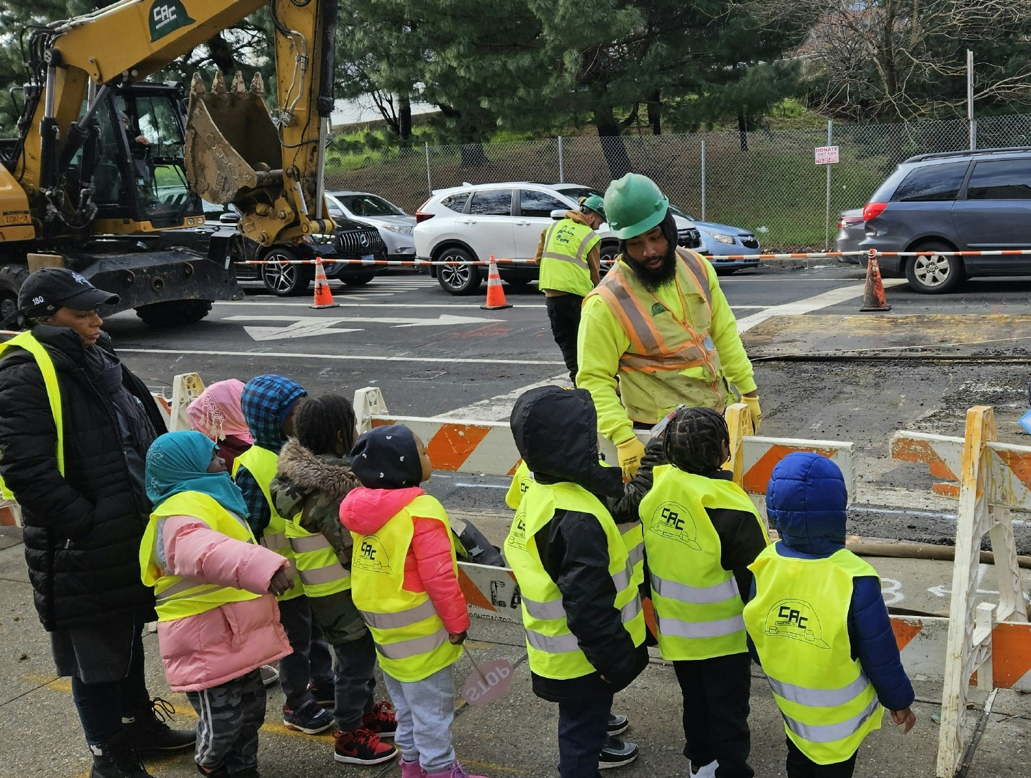 A local kindergarten class gets the VIP experience with a personal tour of a nearby job site and kiddie vests.