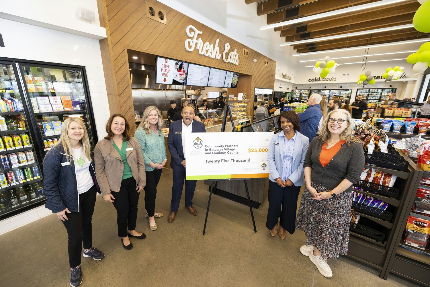 Dash In presents $25,000 check to Dulles South Food Pantry and Keep Loudoun Beautiful at new concept store Grand Opening