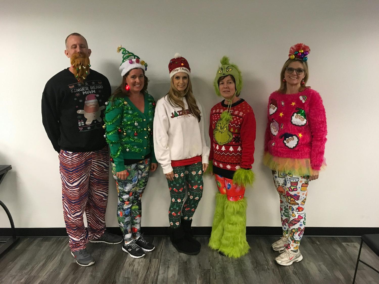 The Management Staff dressed in their holiday best.