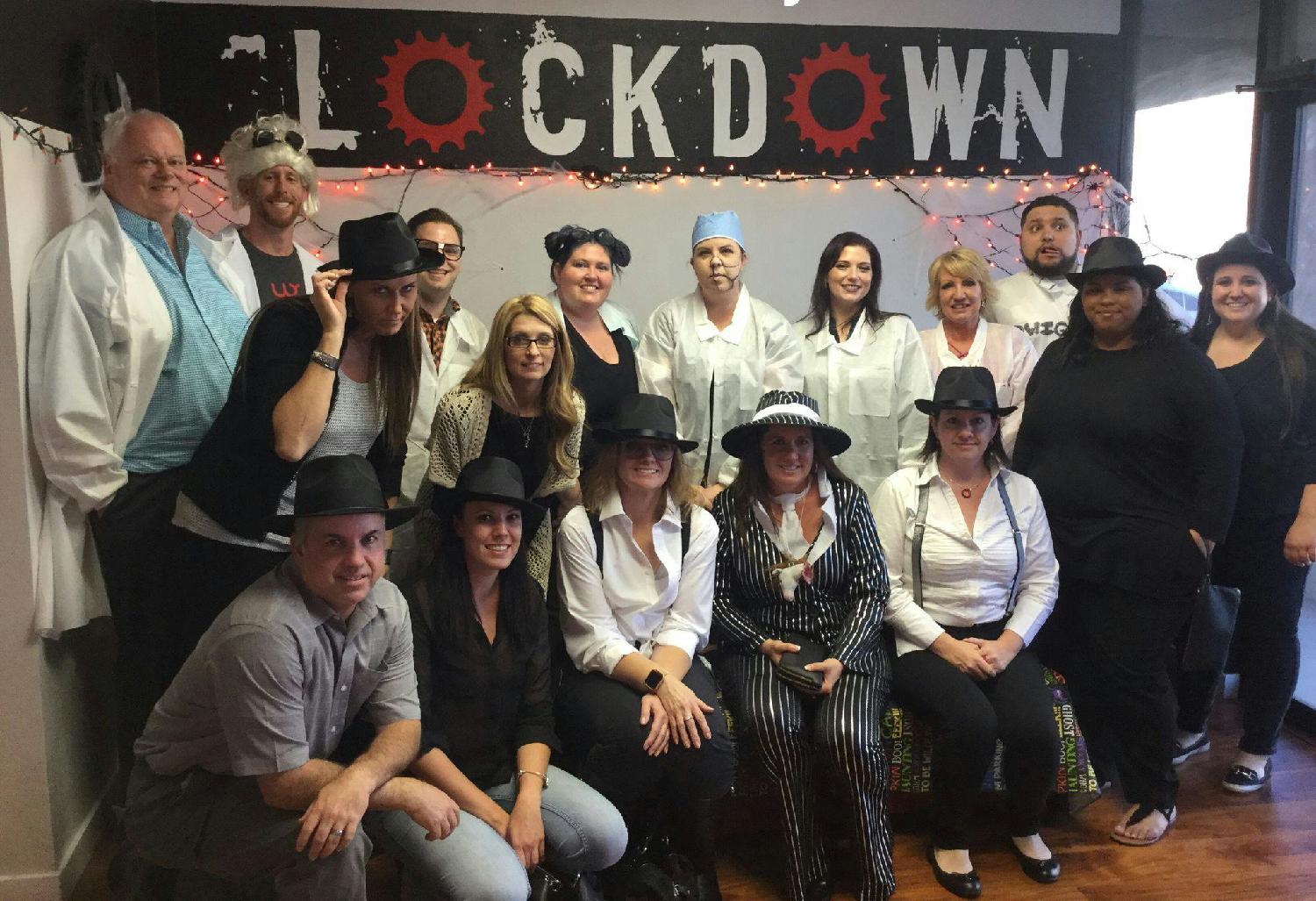 An Ignite Funding staff event at an escape room, where the two teams, the mad scientists and the mob bosses, competed to see who could solve their escape room first.