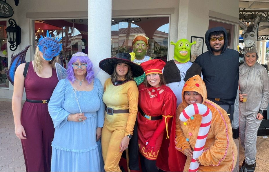 Team members at our corporate office dressed in group costumes for our annual Halloween party and costume contest.