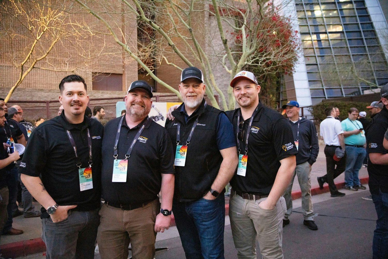 Attendees at our company trade show, ProExpo, show off their Herc Rentals swag while enjoying the block party.