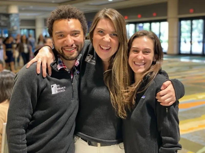 The team attends conferences to network and develop their research knowledge 
