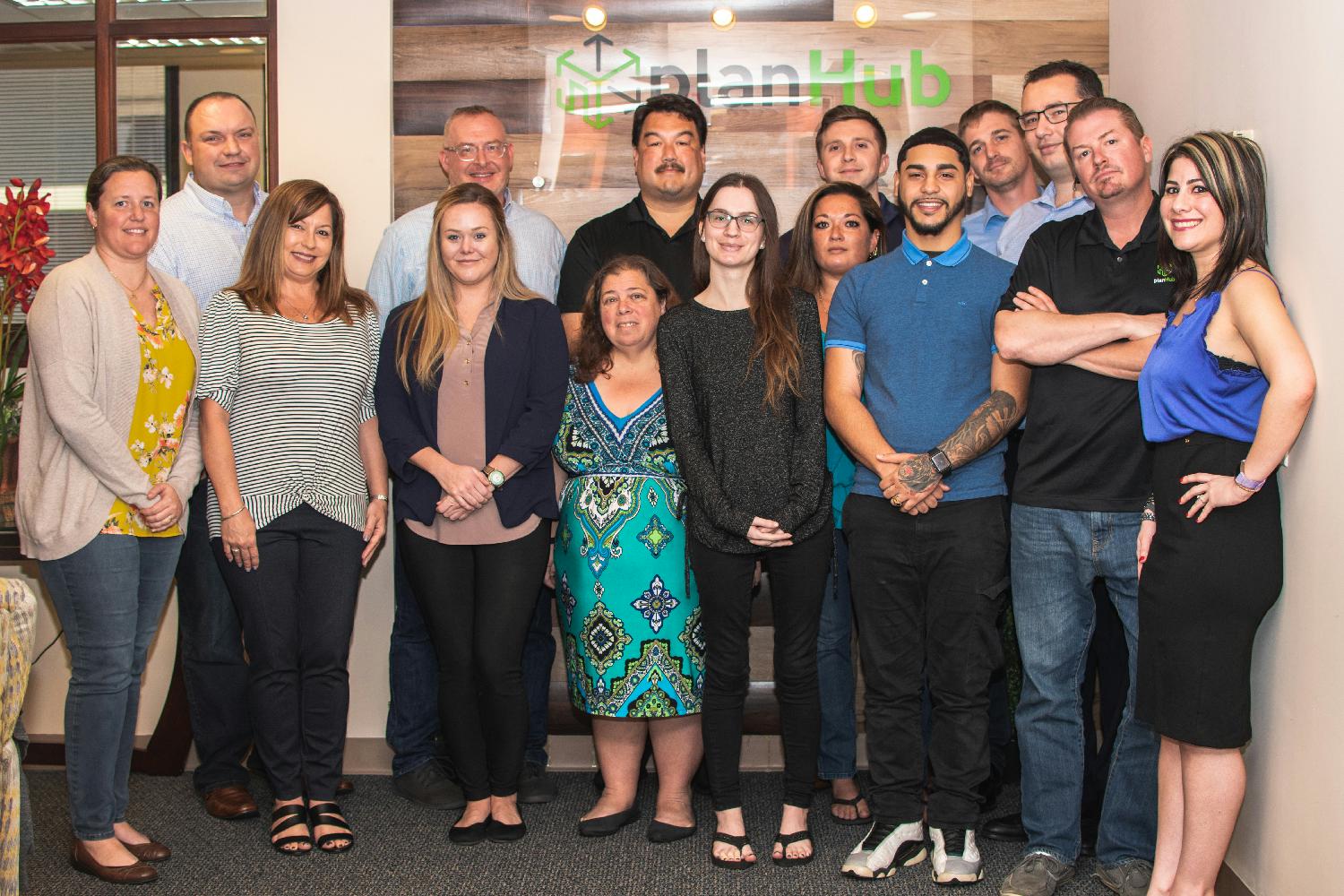 Our PlanHub Team in front of entryway
