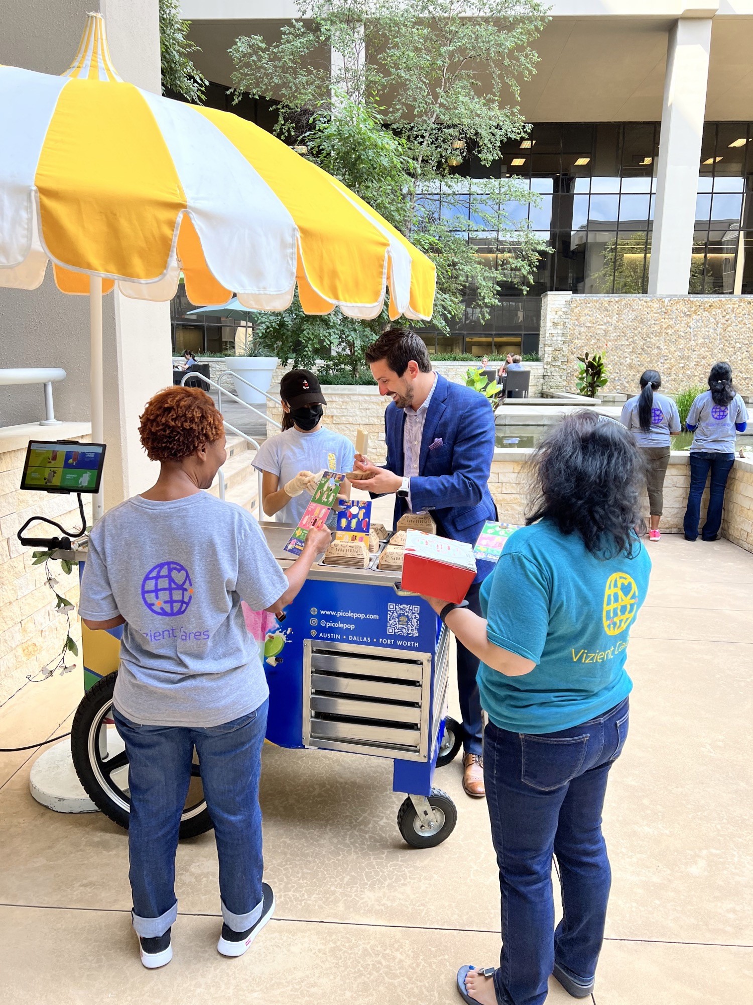 Here employees receive a special treat for assisting during local clothing drive.