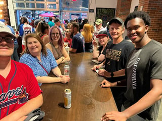 Atlanta office outing at Atlanta Braves game in June 2023. 