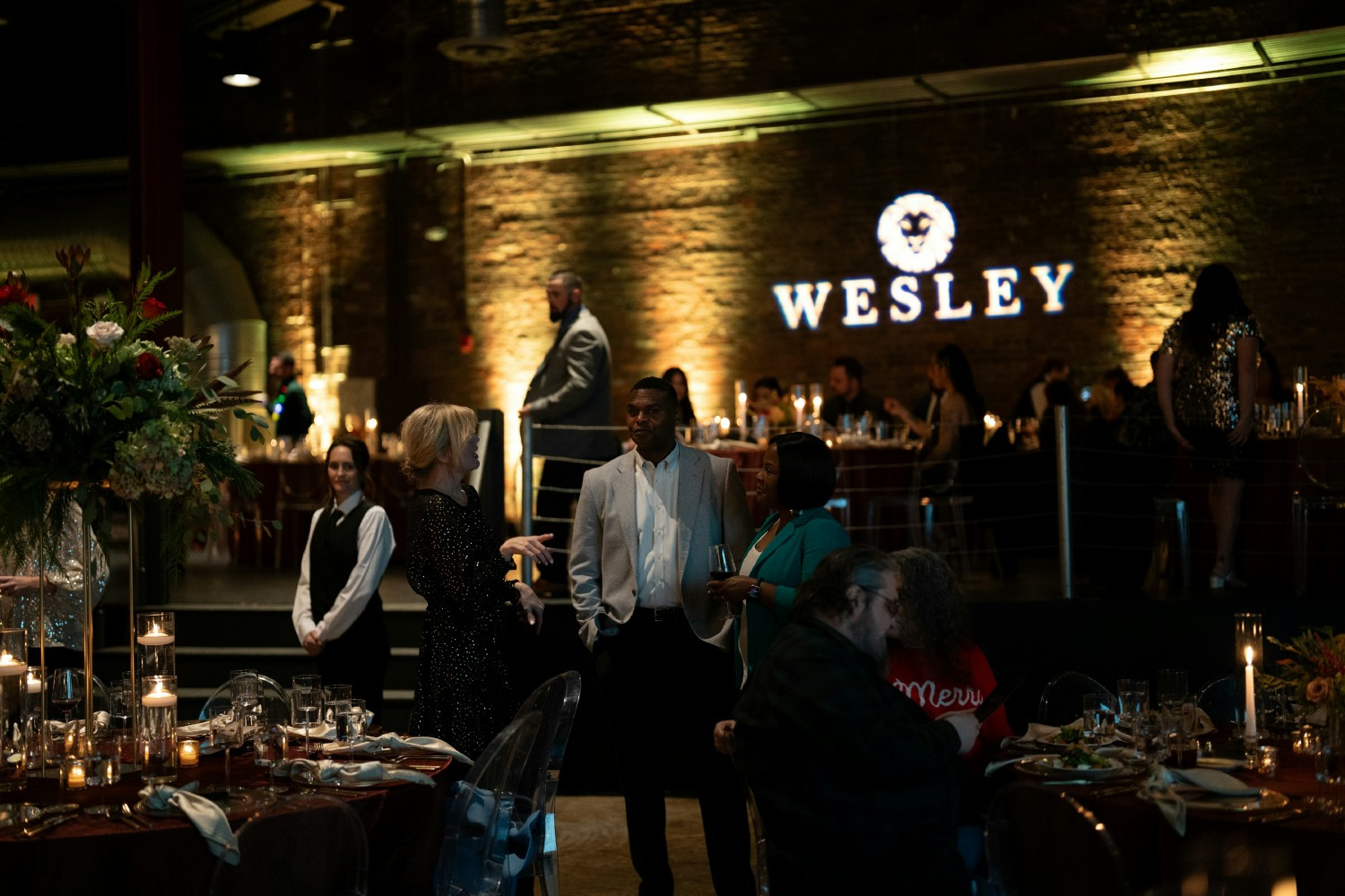 Wesley Financial Group employees attend their monthly all-staff meeting. 