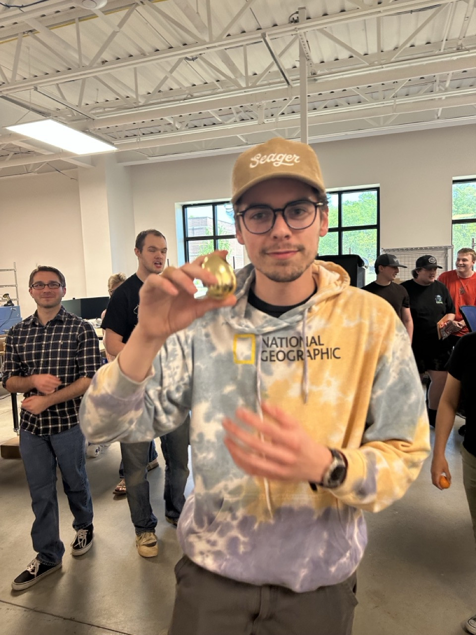 Team Members taking part in our annual Easter Egg Hunt in the warehouse.