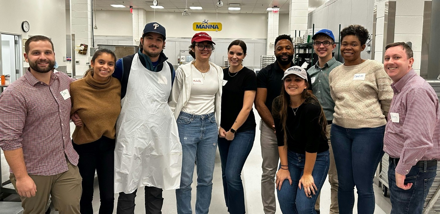 Janney volunteering with MANNA to prepare meals for individuals battling life-threating illnesses