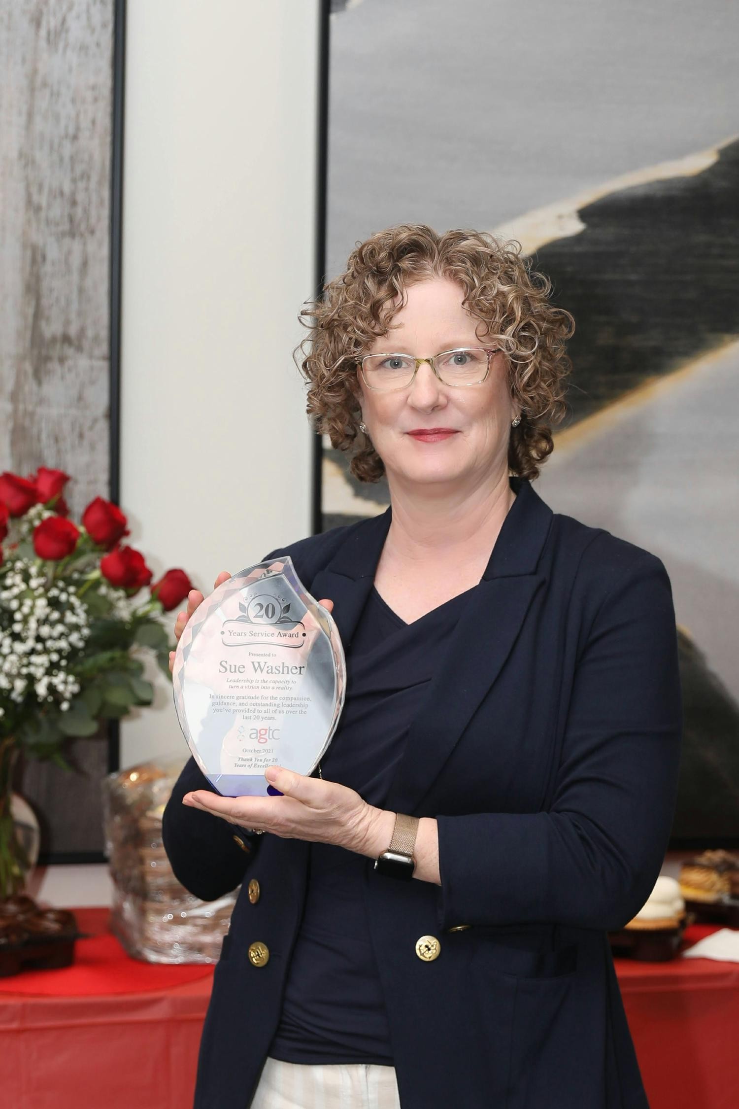 CEO, Sue Washer celebrates her 20th year service award
