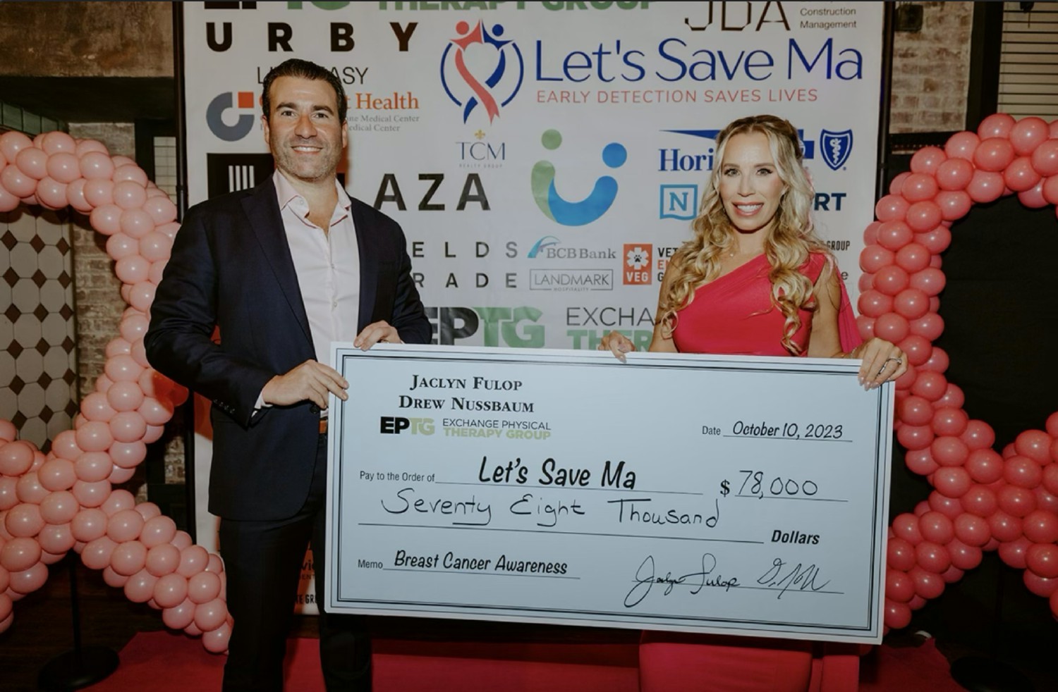 EPTG owners, Drew Nussbaum and Jaclyn Fulop, at Let's Save Ma fundraiser for Breast Cancer Awareness