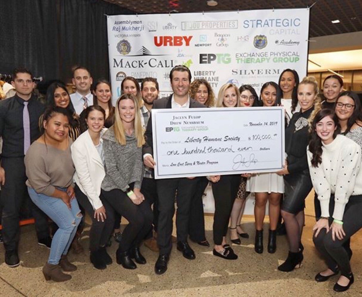 The EPTG team at our 2019 fundraiser for Liberty Humane Society with $100,000 raised.