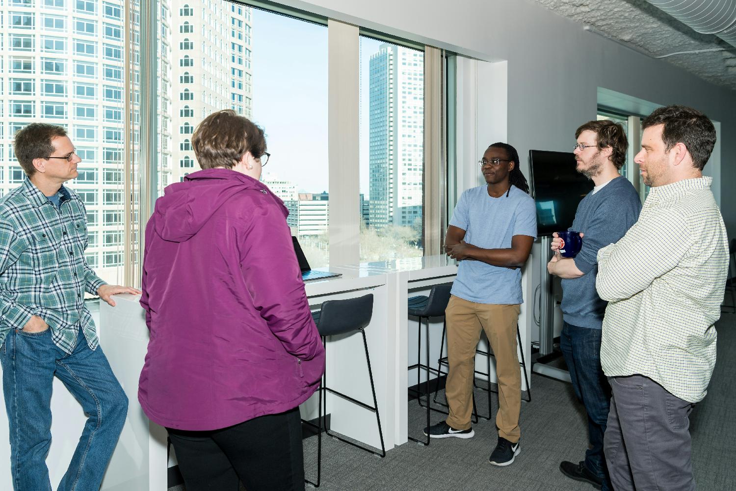 Our Engineering teams have daily stand-ups, remote and in person.  