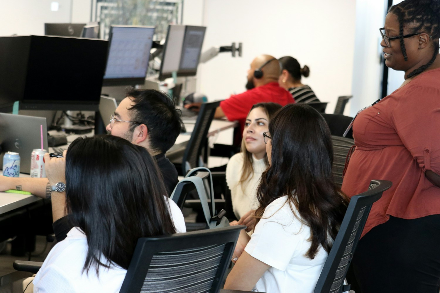 Our Austin team collaborating together. We provide a supportive environment for all to experience growth and development