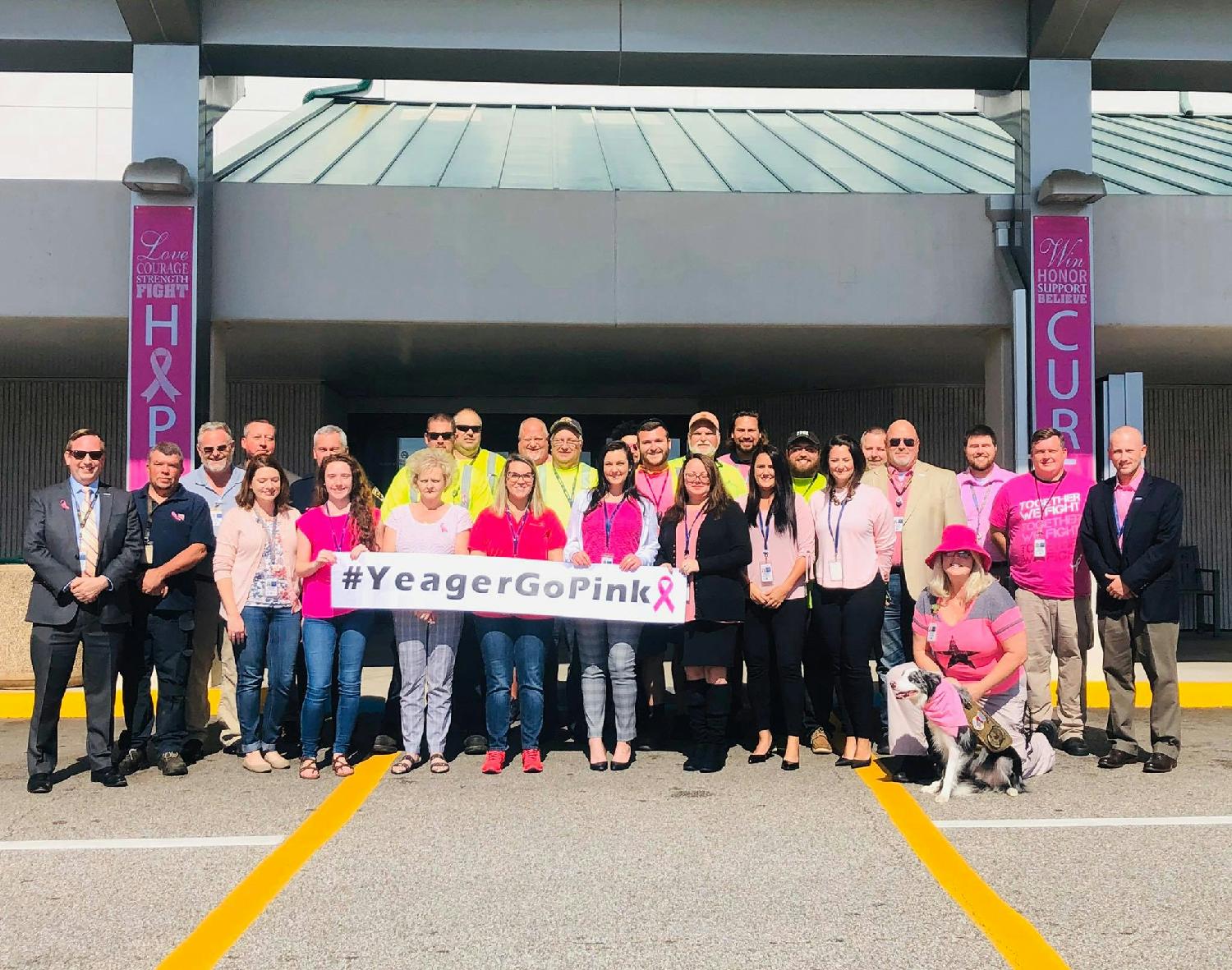 Yeager Airport employees showing support during Breast Cancer Awareness Month.