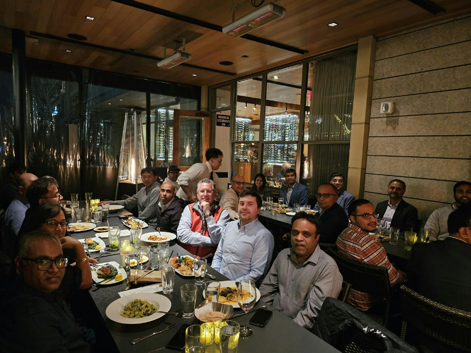 Altimetrik's leaders enjoying a meal together.