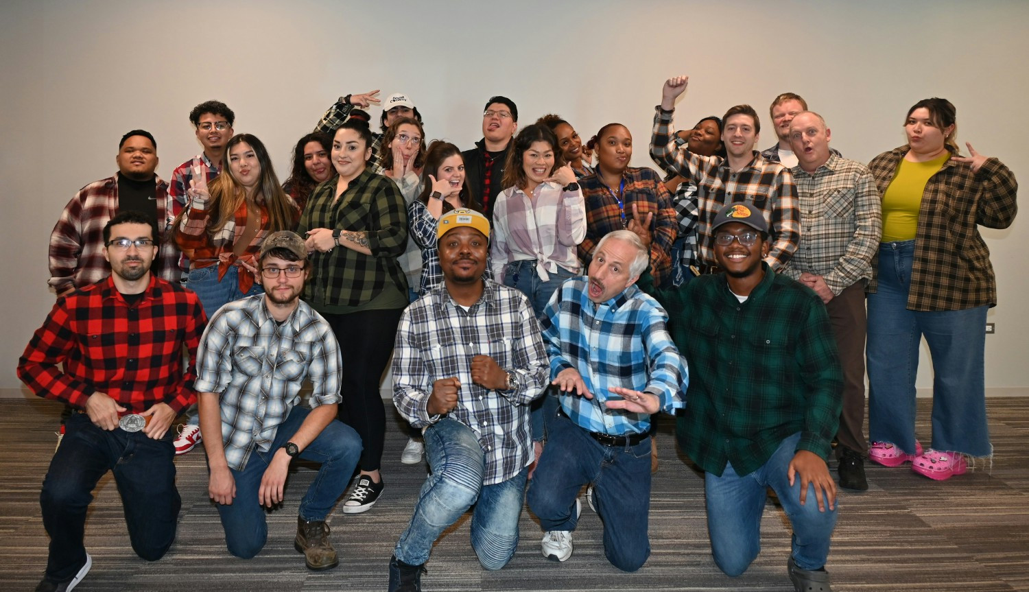 Members of our Call Center/Marketing team showing off their flannels on Flannel Friday!