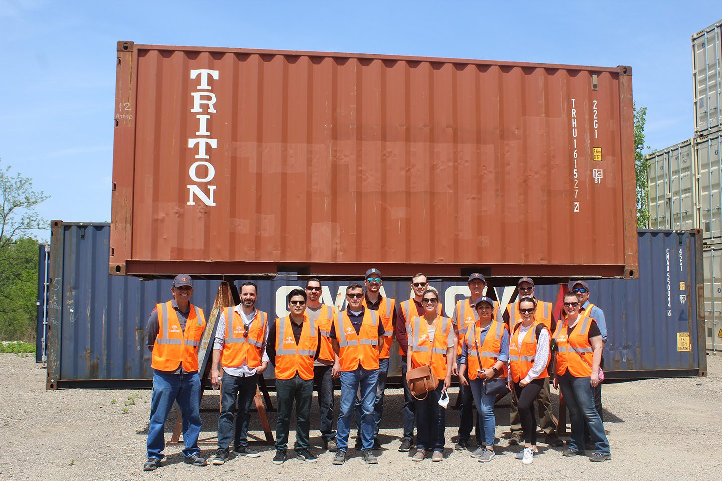 Some of our newly hired employees are having fun on a container depot tour.