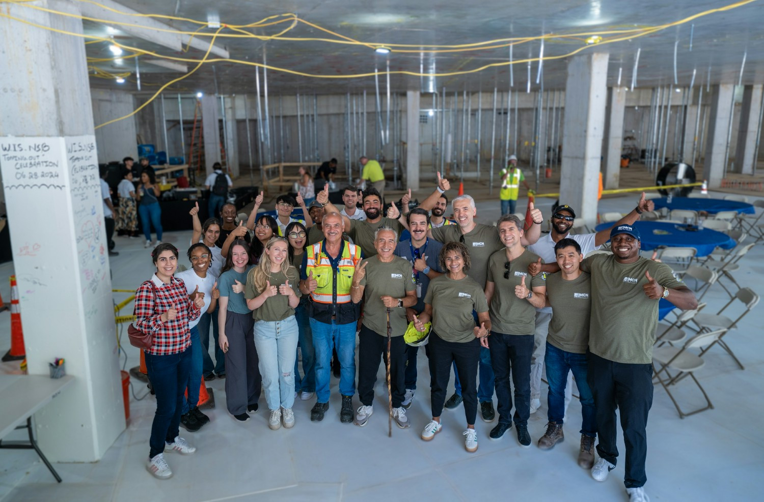 All hands on deck as the MCN team gives back to our subcontractors at our recent topping out ceremony.