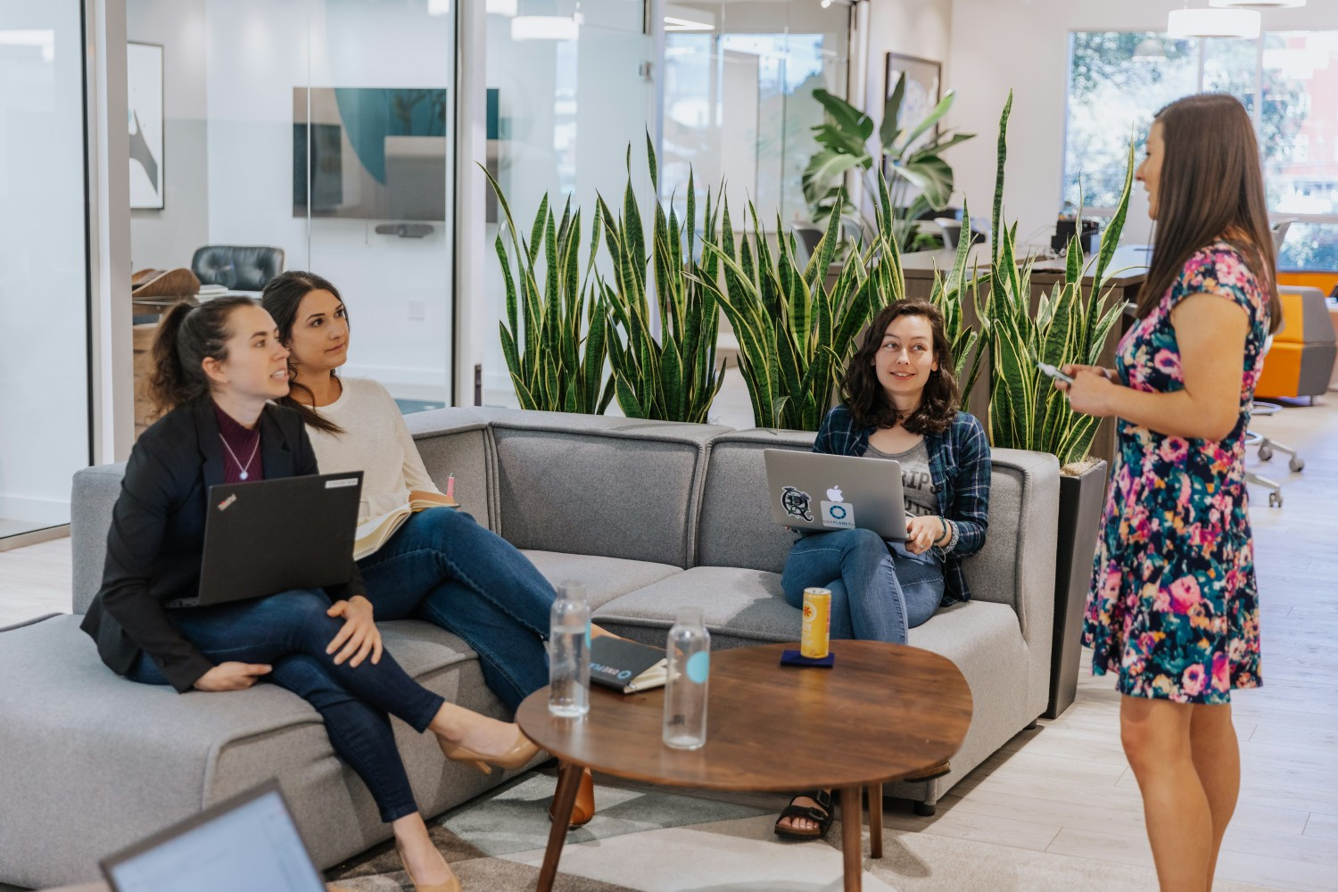 Members of the executive team laughing during a meeting