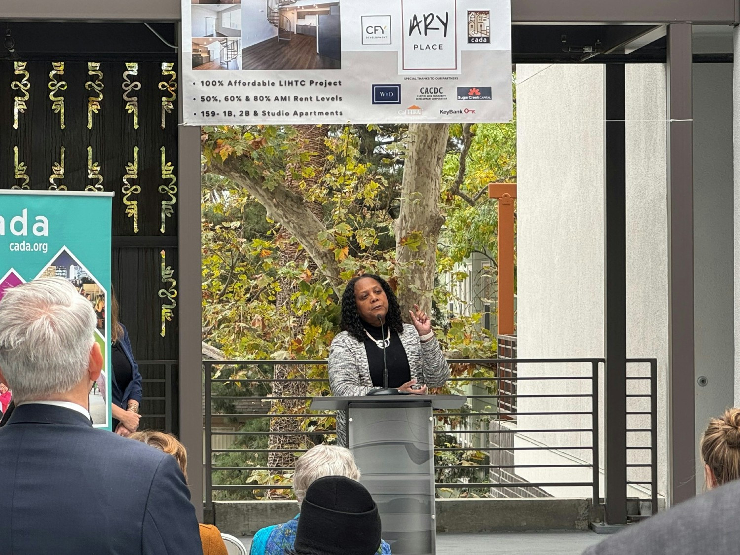 CalHFA's Executive Director, Tiena Johnson Hall speaking at a grand opening for an affordable housing project. 