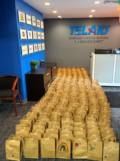 Telaid partnered with the United Way & Boys and Girls Club by building over 2000 healthy snack packs for those in need.