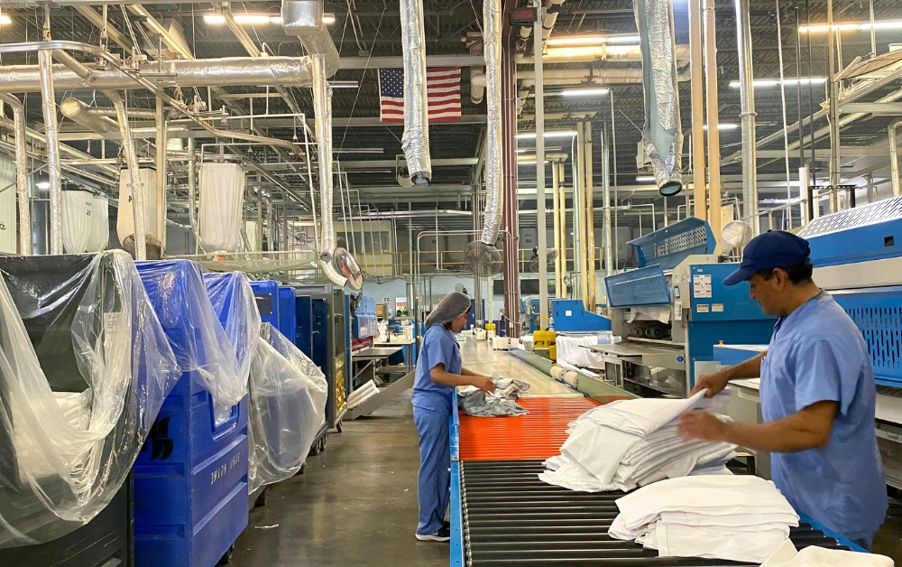 HLSG plant employee's exemplifying their daily tasks as folders! 