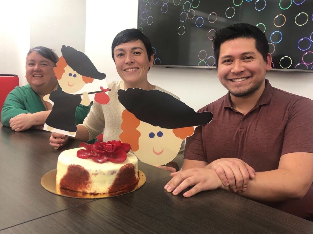 Vera employees in Los Angeles with two of our favorite things- food and Flat Vera (our cultural avatar who tags along with Verans in all sorts of adventures!)