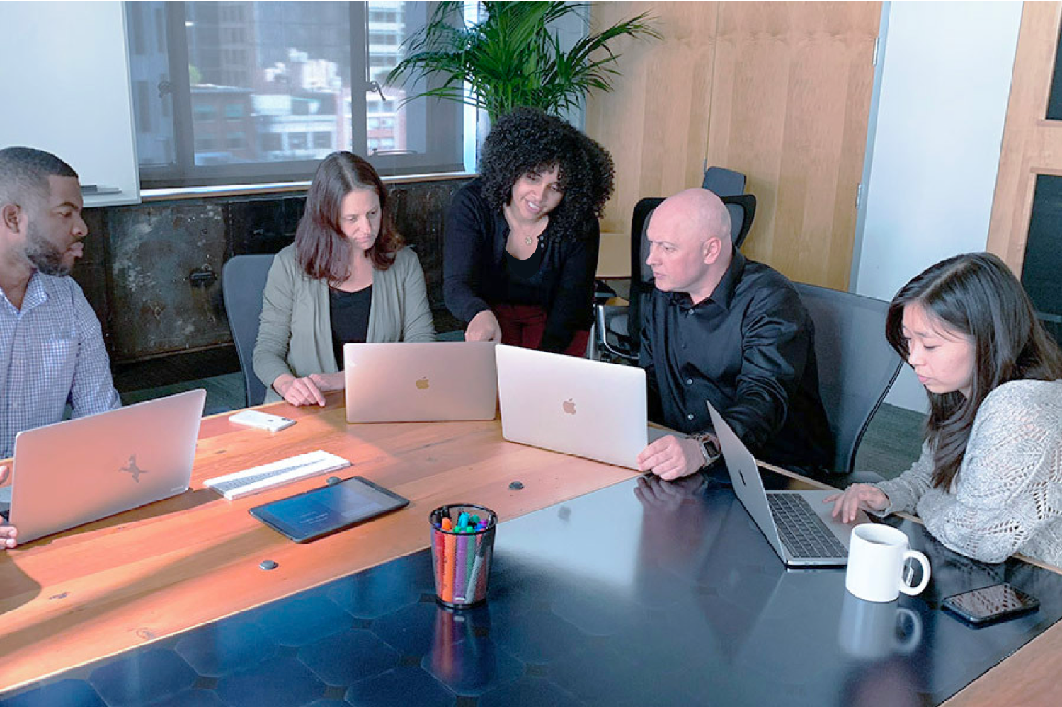 Energy Foundation work team collaborating in our main conference room