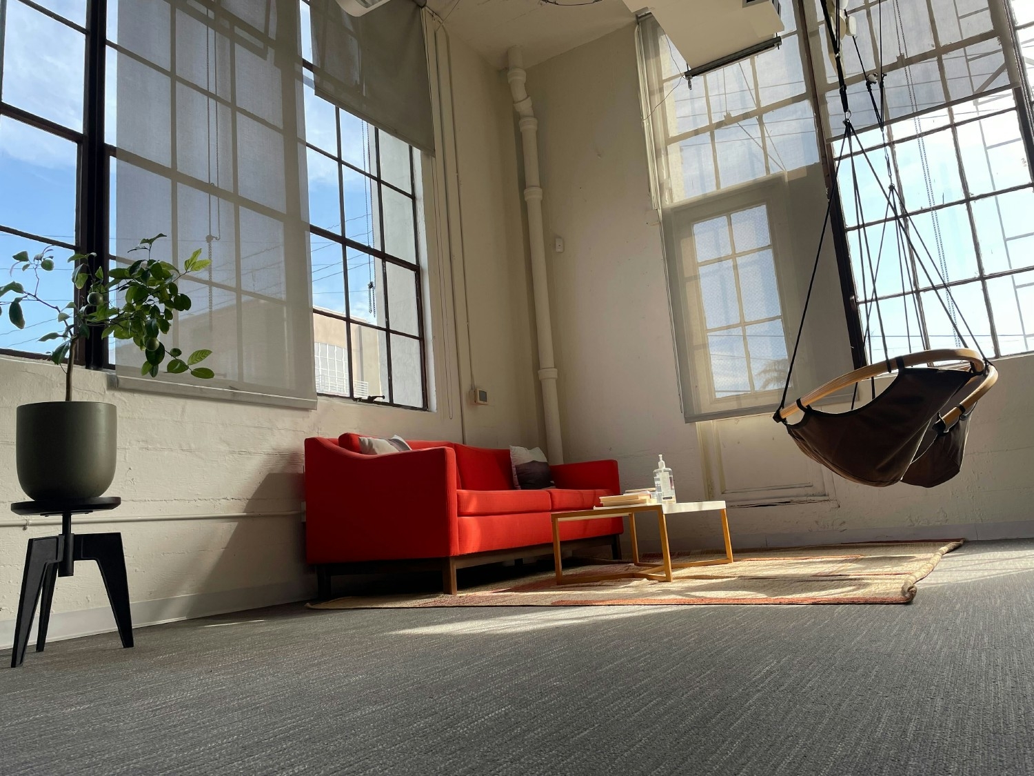 Tally HQ in San Francisco features an open floor plan with plenty of communal spaces to work including swing chairs. 