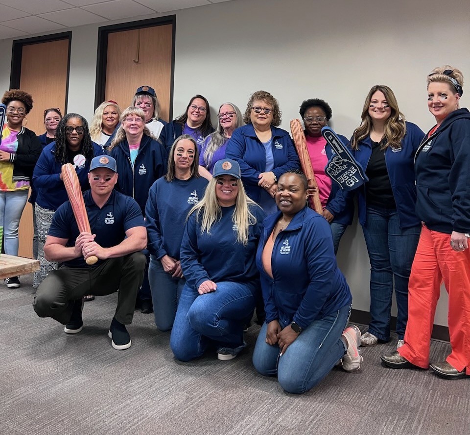 Fort Worth Team celebrating Baseball-themed event.