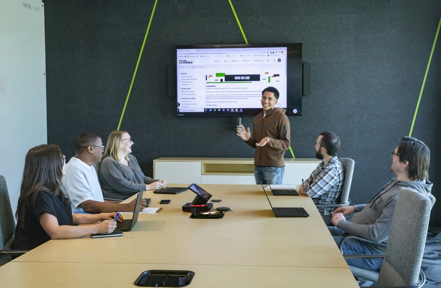 Team members gather in one of our conference rooms for a meeting.