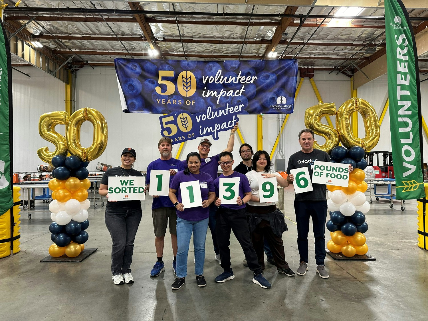 Colleagues volunteer at Second Harvest of Silicon Valley and pack 11,396 pounds of food for those in need