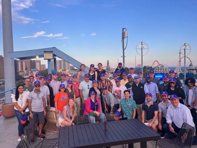 Teladoc Health colleagues gathering at a baseball game, including CEO Jason Gorevic