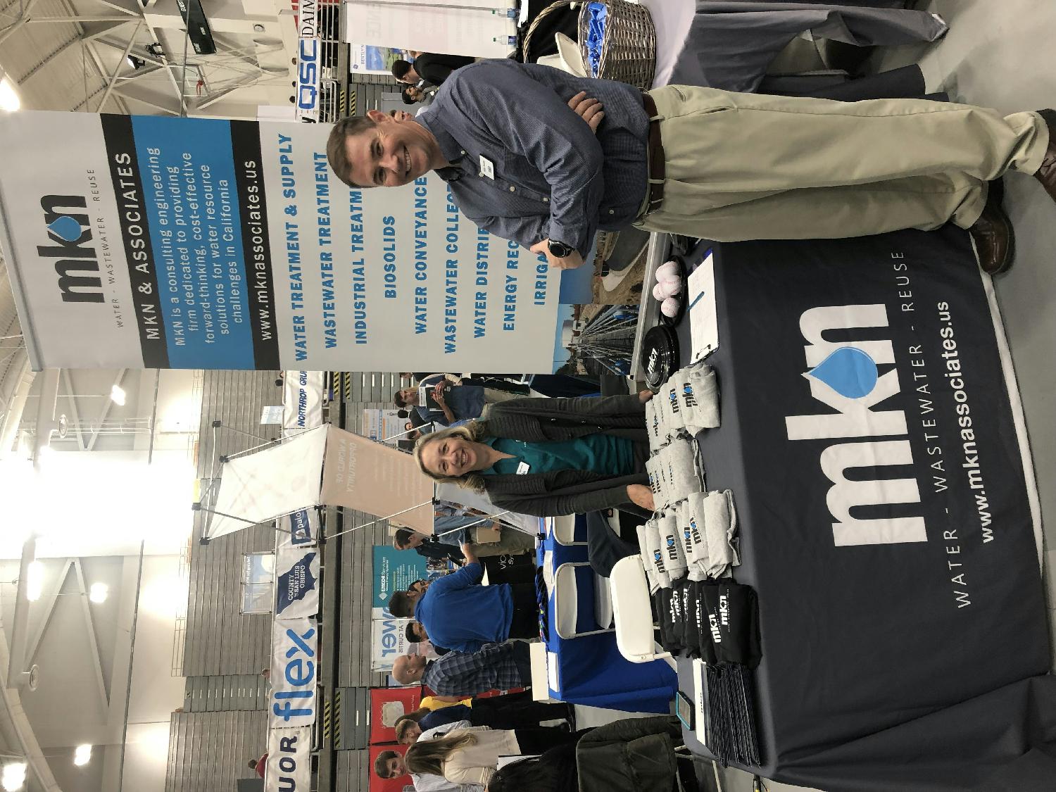 MKN owner and CEO Michael Nunley, with Carrie Yamate, at Cal Poly 's 2019 Career Fair. 