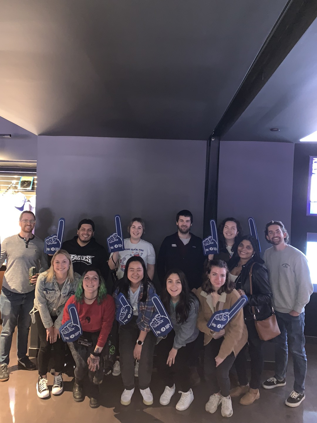 Crew members at a Flyers game outing - one of the many events and activities planned by our Culture Committee.