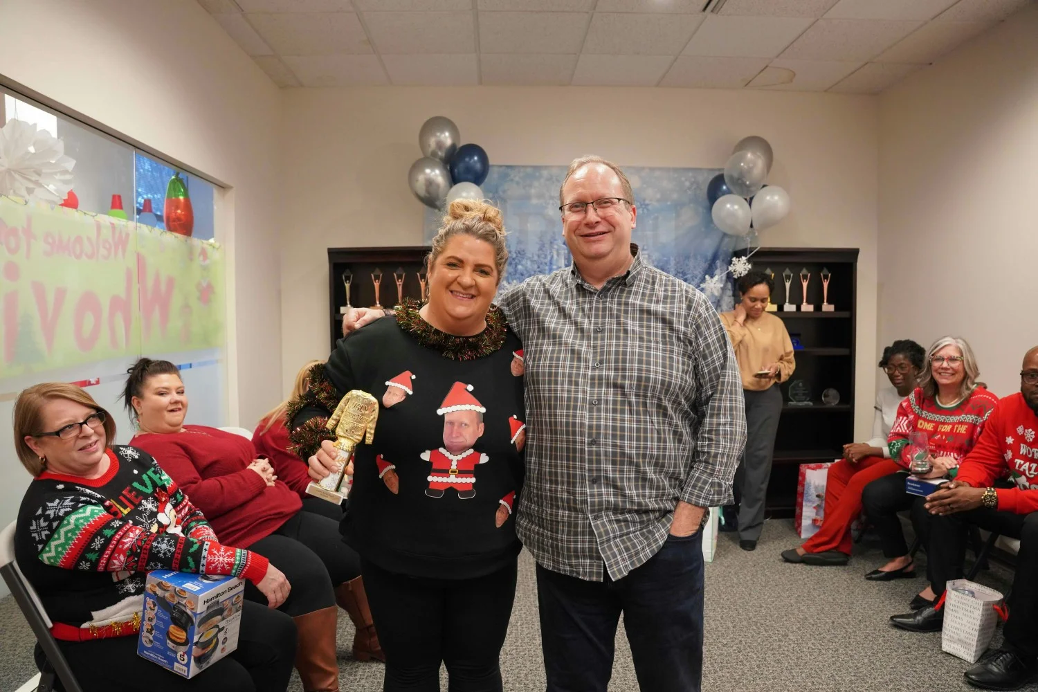COMPANY CULTURE: Joy and celebration define our workplace. Annual holiday party unites teams in festive atmosphere.