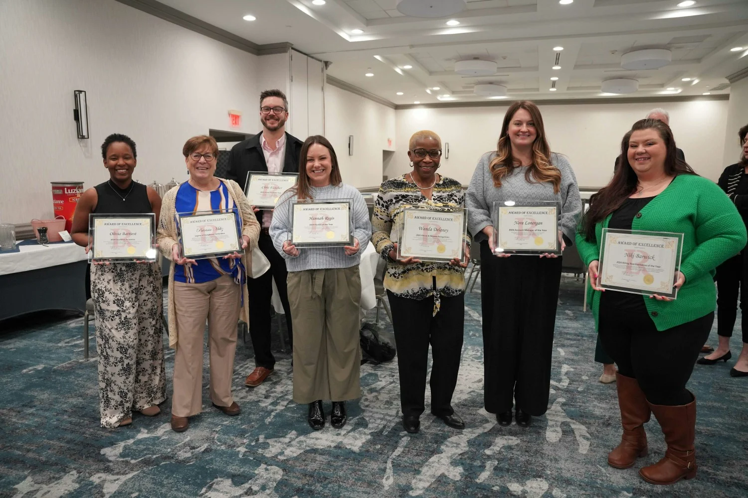 RECOGNITION: Awards of Excellence ceremony celebrates outstanding performance. Leadership honors team members values.