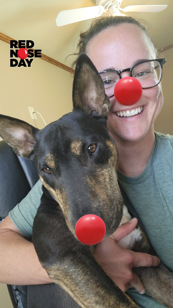 Employees participate in the National Red Nose Day to help end child poverty.